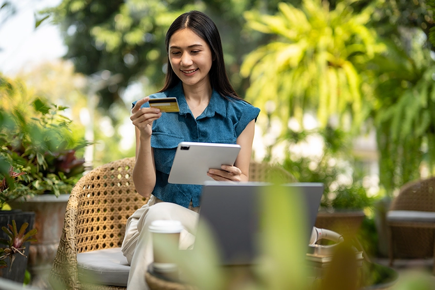 Woman holding credit card